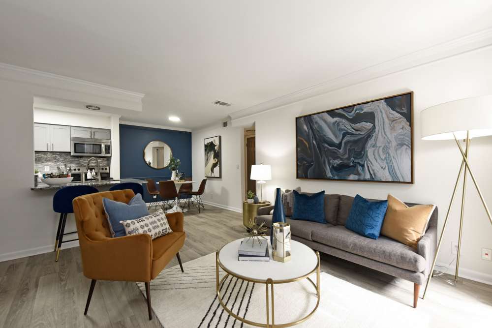 Apartment with a spacious and beautifully furnished living area at The Metropolitan in Nashville, Tennessee