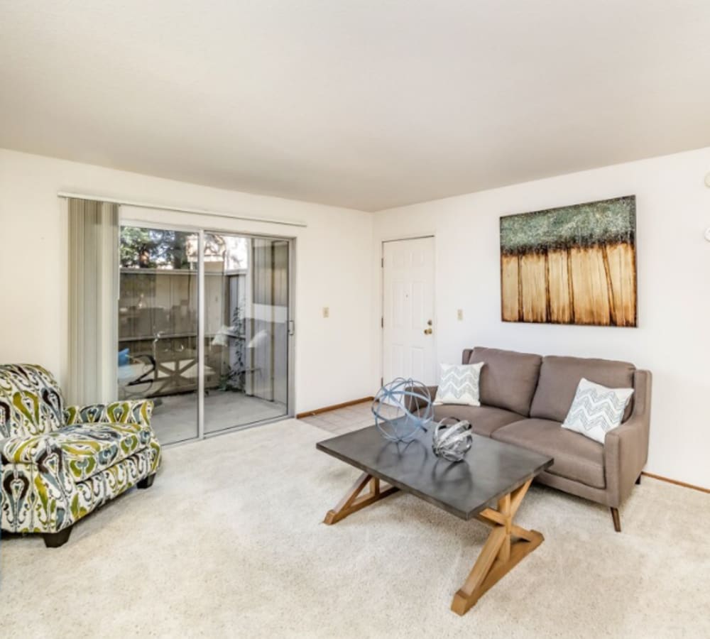 Living room with attached closet at Cameron Oaks Apartment Homes in Cameron Park,California