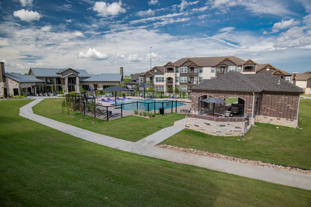 Overview of property pool and cabana area at Cedar Ridge in Tulsa, Oklahoma