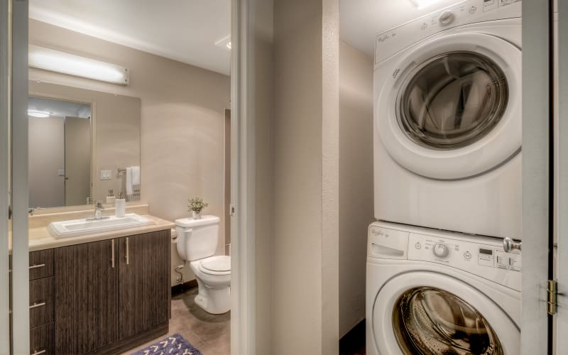 Stacked washer and dryer at Karbon Apartments in Newcastle, Washington