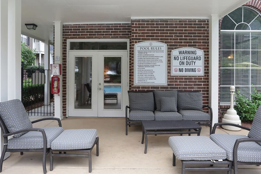 Poolside outdoor lounge area at Castlegate Collier Hills in Atlanta, Georgia