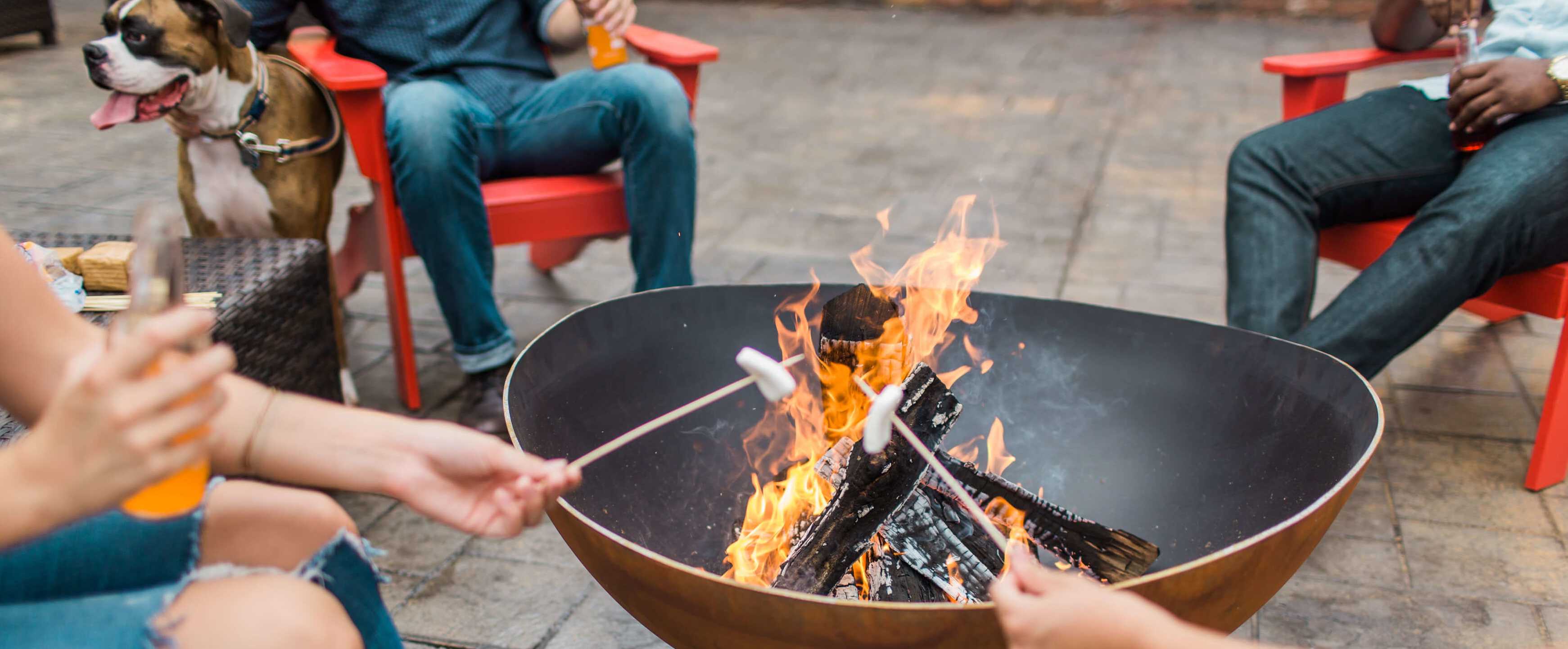 Grilling outside with friends at The Adelade