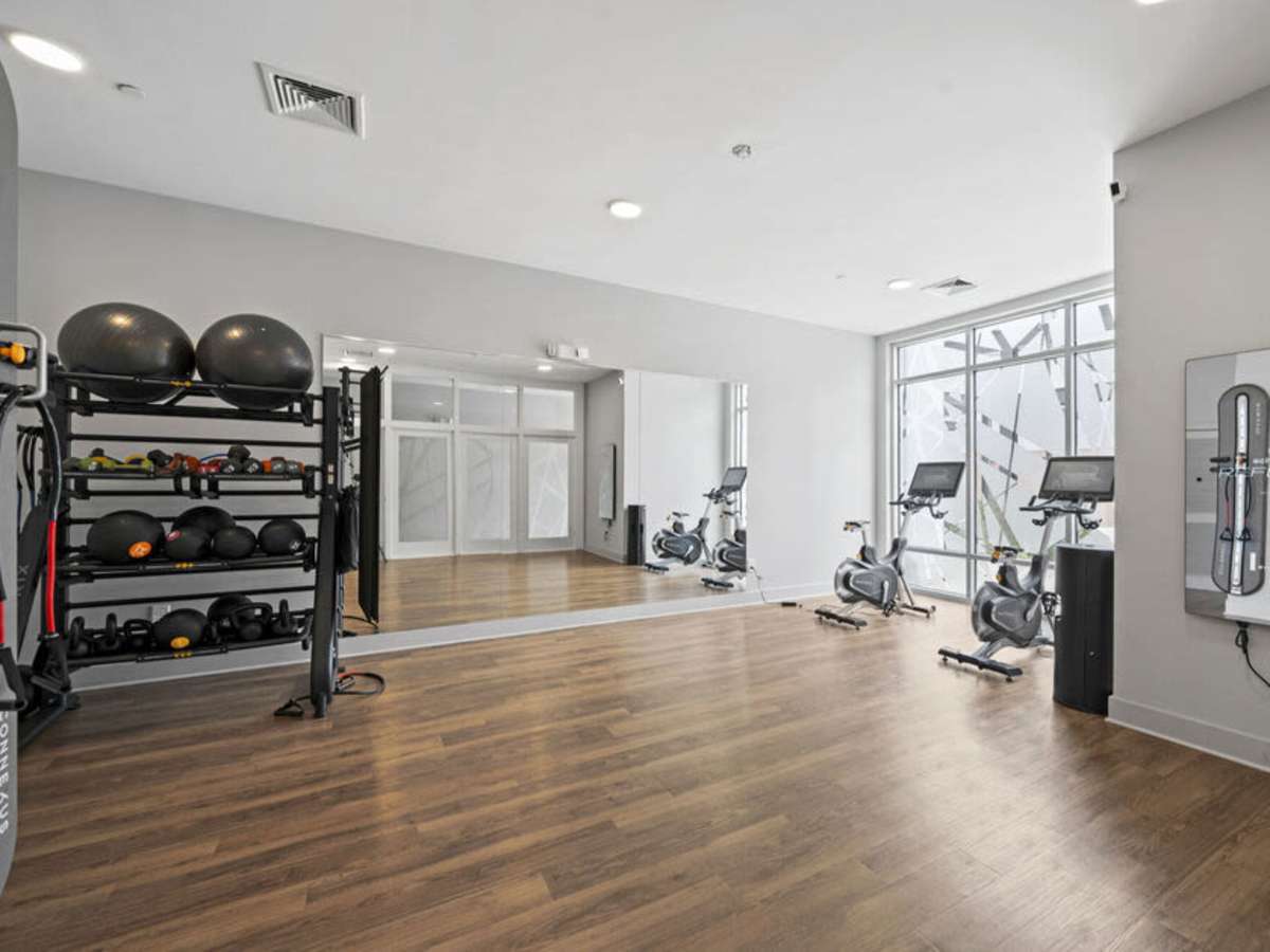 Fitness center with exercise ball and cycling machine at The Rise at Regency in Henrico, Virginia