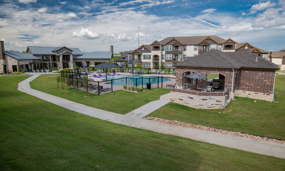 Open and bright model living room at Cedar Ridge in Tulsa, Oklahoma