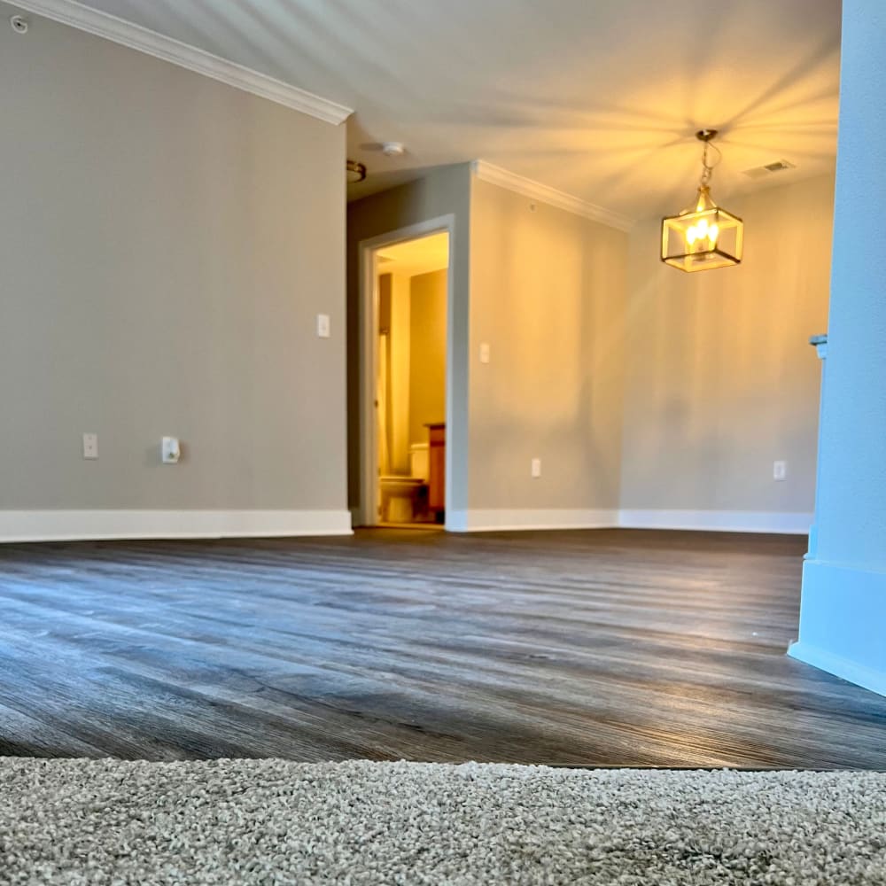 Wood-style flooring in an apartment dining room at The Legends on the Park in Eureka, Missouri