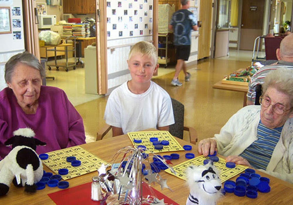 Residents having fun playing a game at East Troy Manor in East Troy, Wisconsin