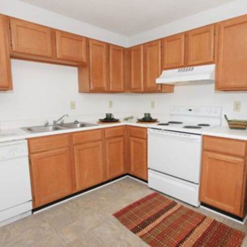 Kitchen with wooden cabinets at Forest Ridge in Fort Mill,South Carolina