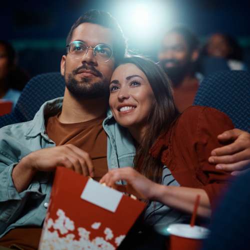 Resident family watching movie in theatre at Valley Park Subdivision in Jackson, Mississippi