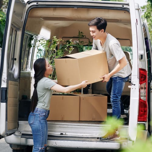 A couple loading a van with boxes to be stored at Red Dot Storage in Morgantown, West Virginia