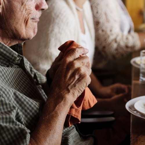 Resident having a meal at Oxford Springs Tulsa Memory Care in Tulsa, Oklahoma