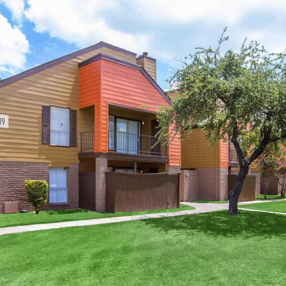 Exterior view of the community building at Barcelo Apartment Homes in San Antonio, Texas