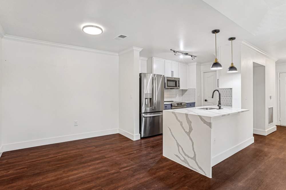 Stainless steel refrigerator in the kitchen at Cypress in McKinney, Texas