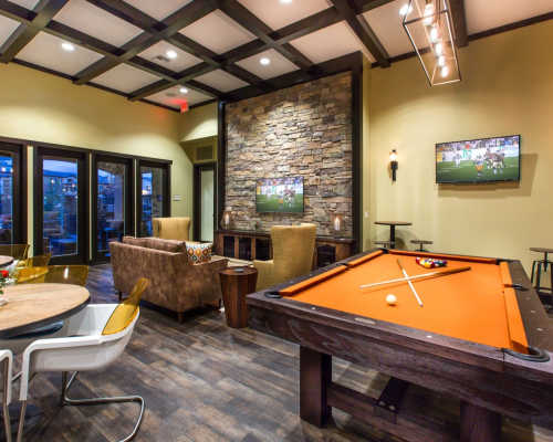 Clubhouse with game room at Hollister Village Apartment Homes, Goleta, California