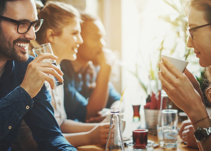 Couple having drinks at Willow Oaks Apartments in Chesapeake, VA