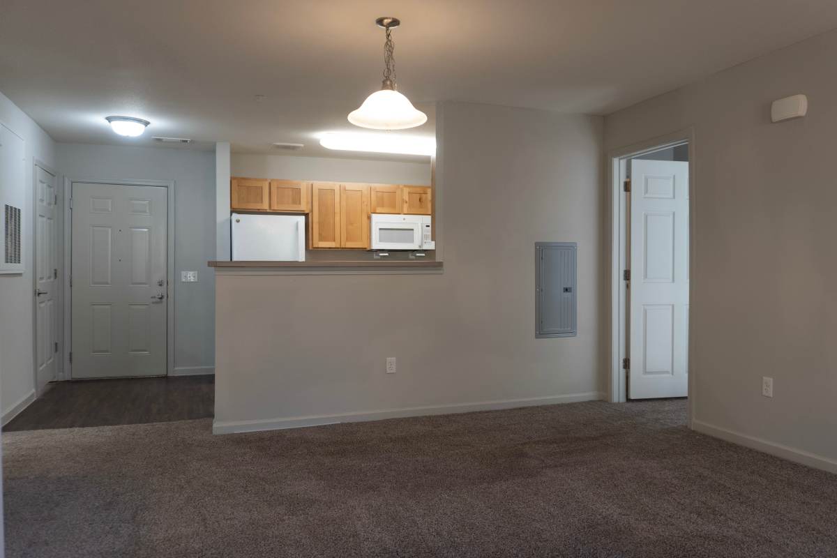 Open kitchen and living area of apartment at Redland Creek in Lawrenceville, Georgia