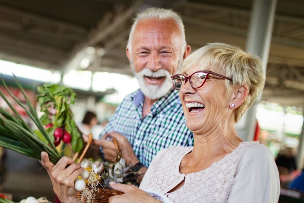 Residents out grocery shopping at the local farmers market at The Vintage at South Meadows Condominium Rentals in Reno, Nevada