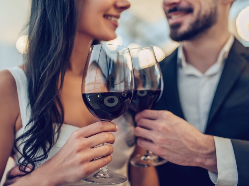 A couple enjoying wine on date night near Haven Warner Center in Canoga Park, California