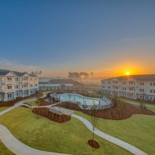 Resort-style pool at sunset at The Mason in Augusta, Georgia