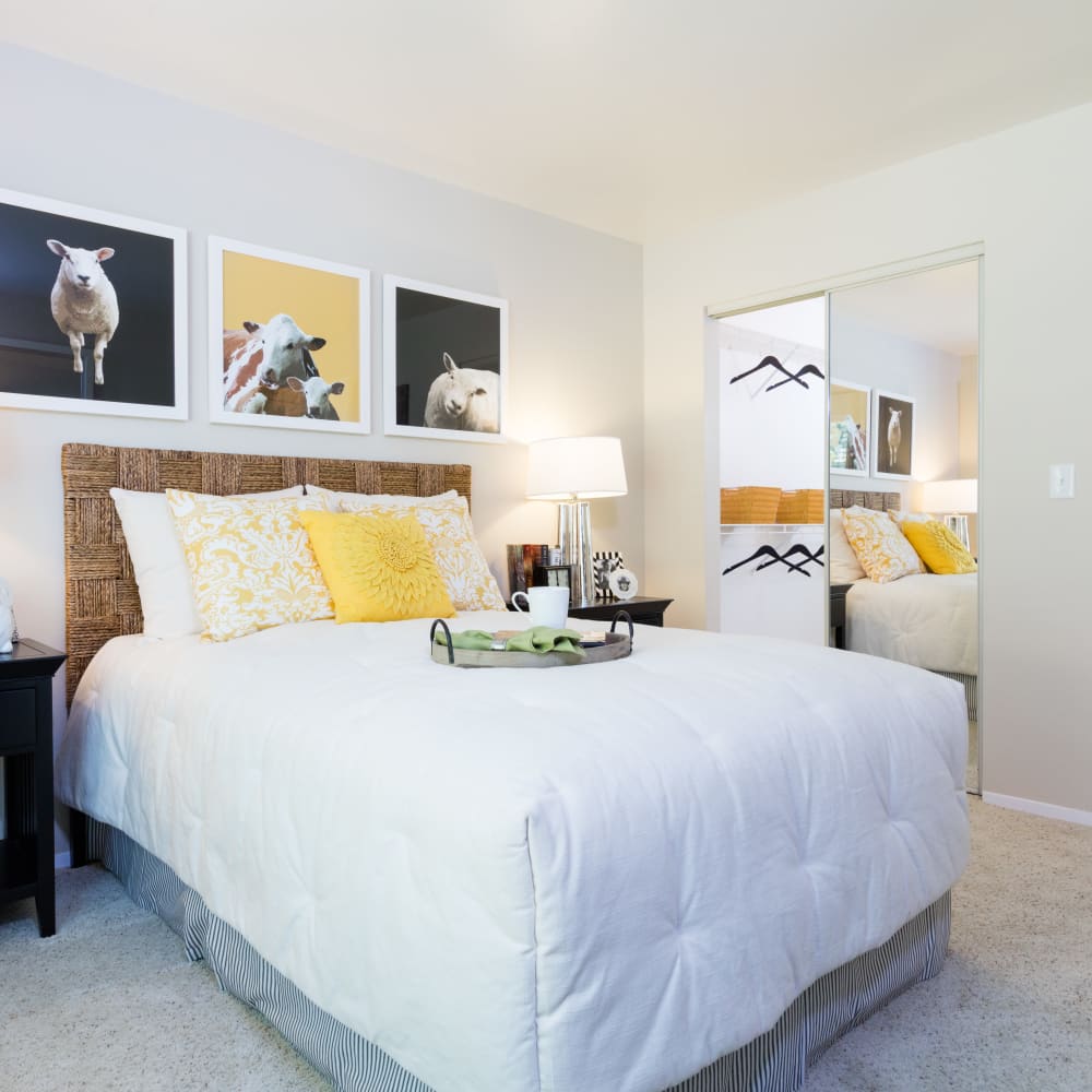 Spacious and modern bedroom with plush carpeting in a model home at Skyline at Murrayhill in Beaverton, Oregon