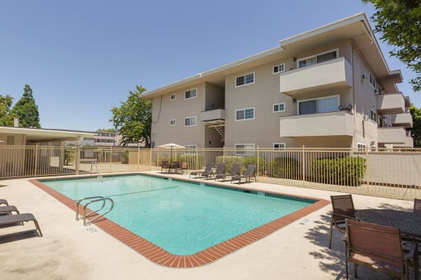 Inviting outdoor swimming pool at Bancroft Towers in San Leandro, California