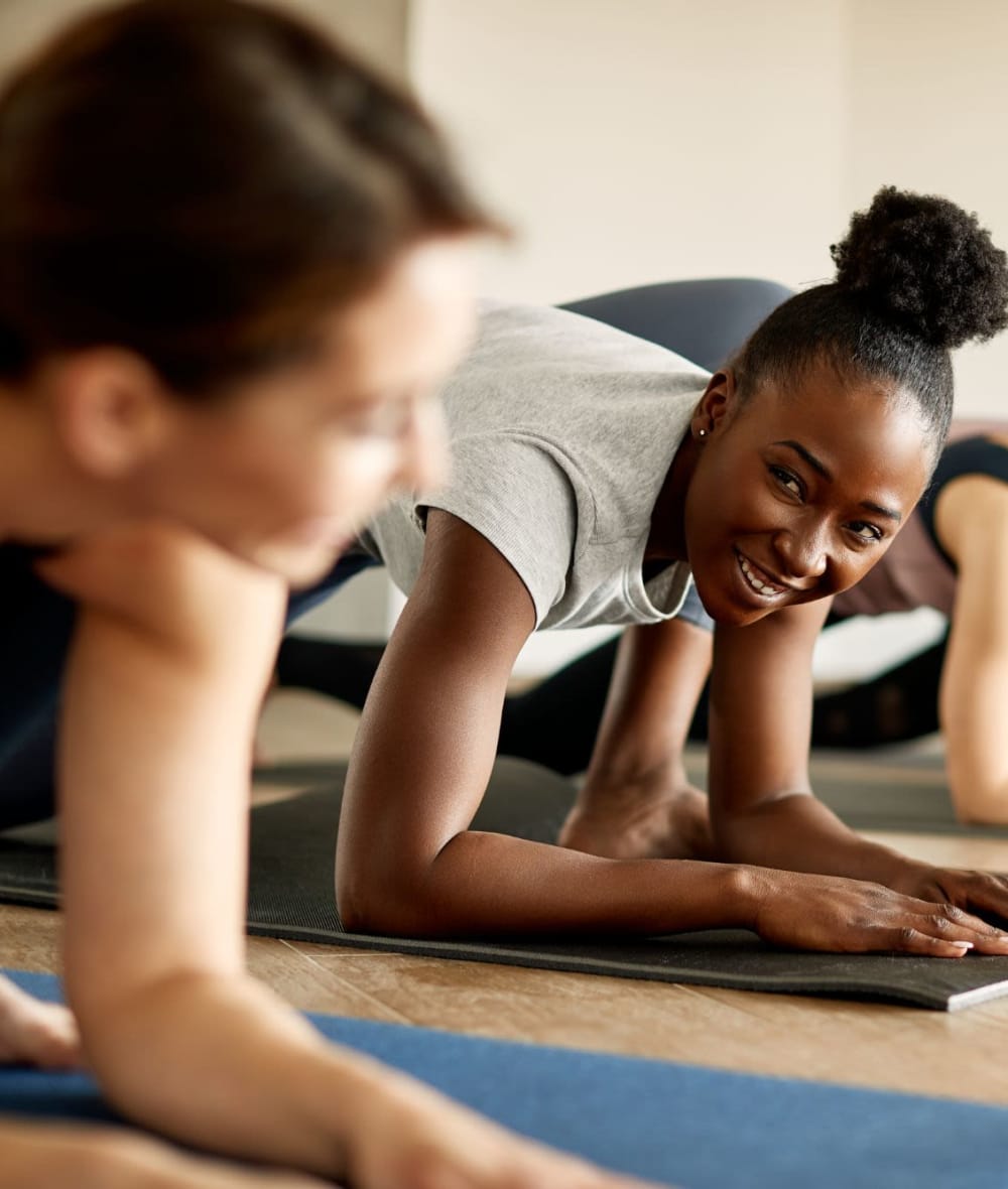 Residents doing yoga at Elms at the Refuge in Laurel, Maryland