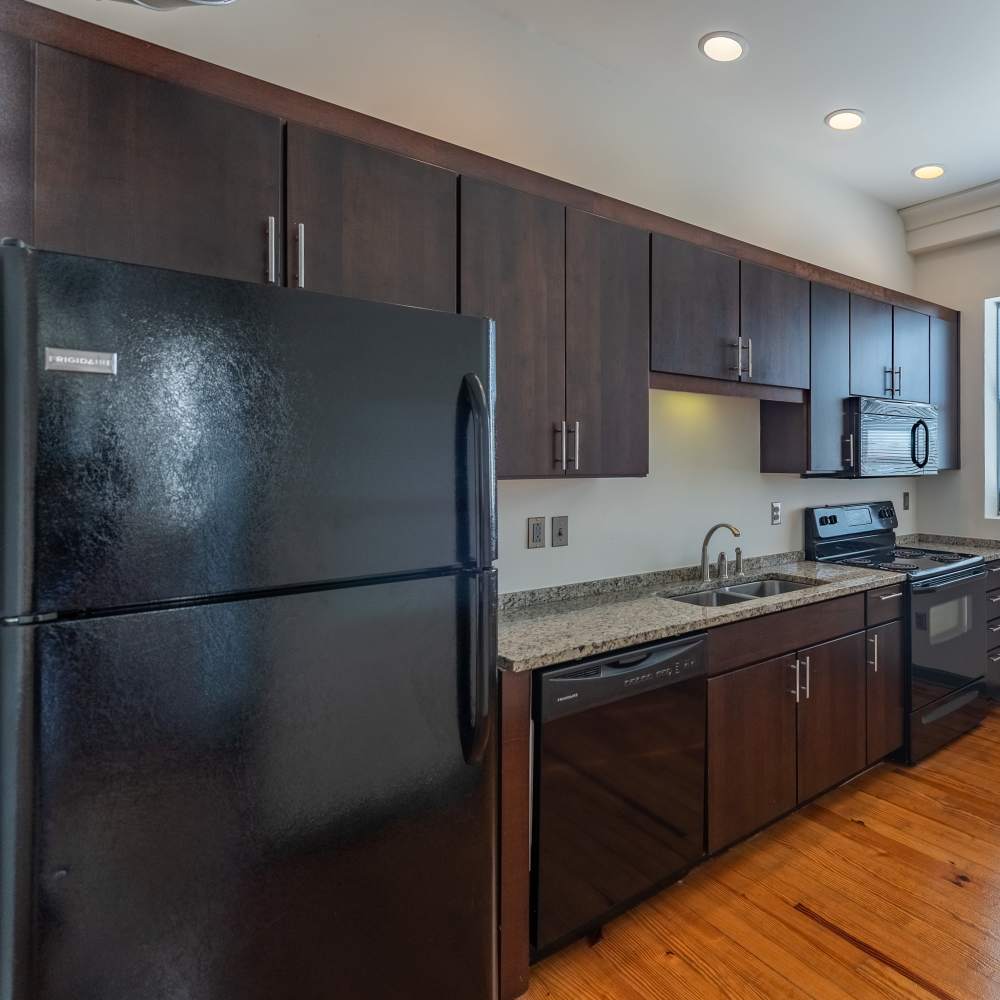 Kitchen with energy-efficient appliances at Hopper Lofts in Richmond, Virginia