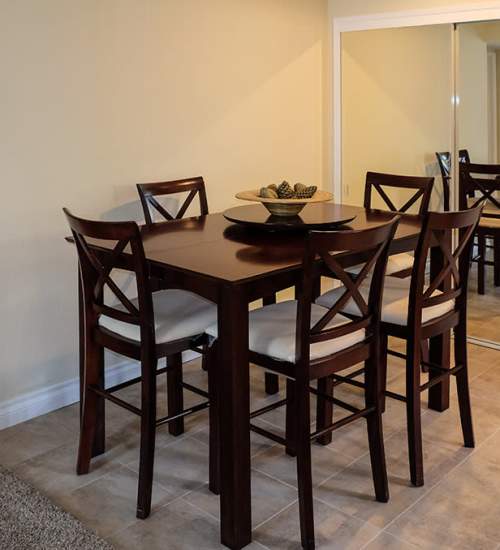 Dining area with chairs at Shadowridge Summerwind in Vista, California