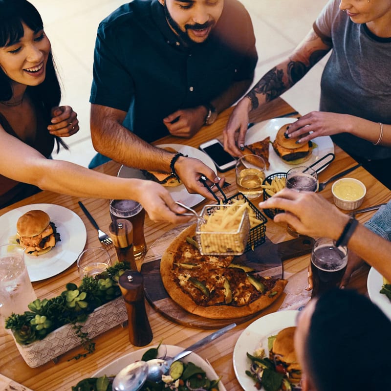 Friends enjoy a meal near Attain at Bradford Creek, Huntsville, Alabama