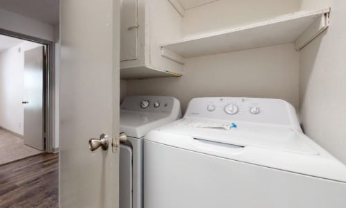 Washer and dryer in a home at The Haylie in Garland, Texas