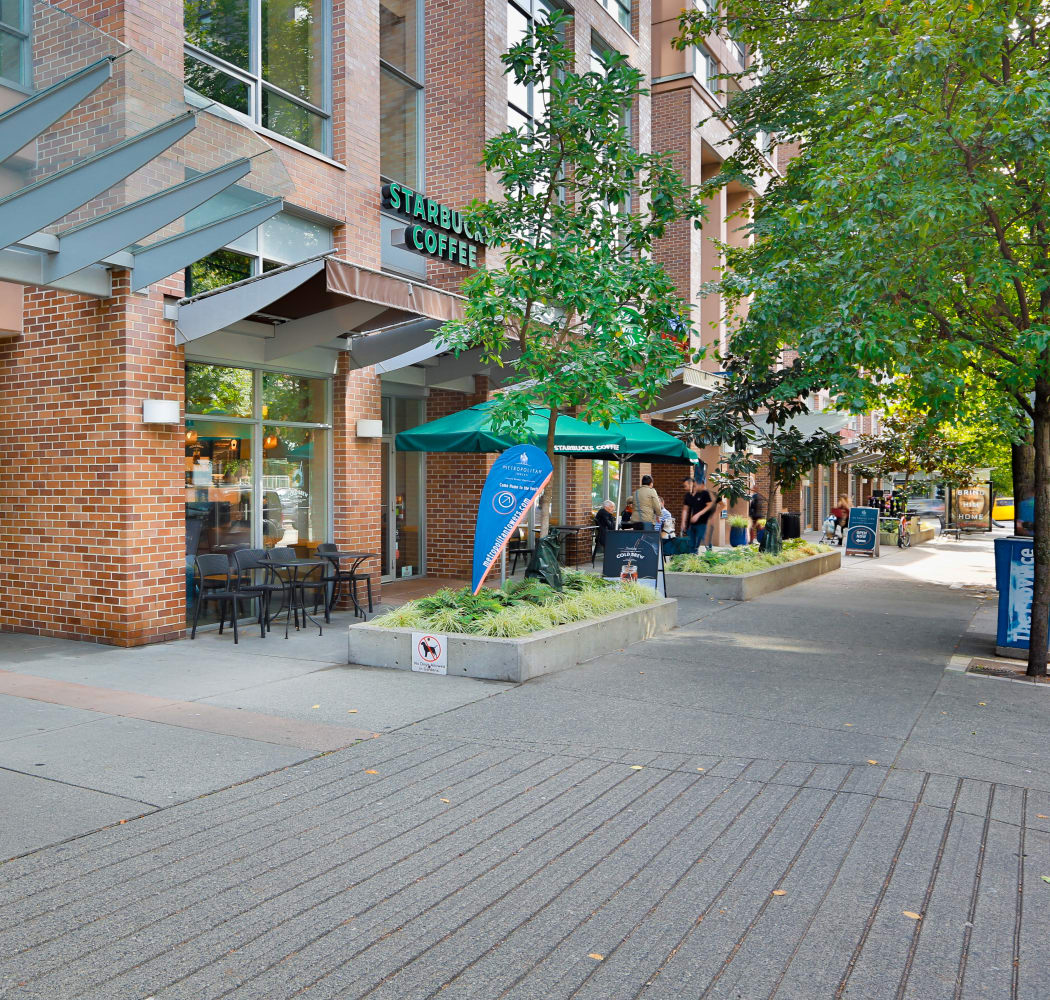 Curbside view of Metropolitan Towers in Vancouver, British Columbia