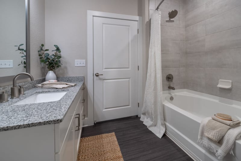 Roomy bathroom with lots of storage space under the large vanity at Reunion at 400 in Kissimmee, Florida