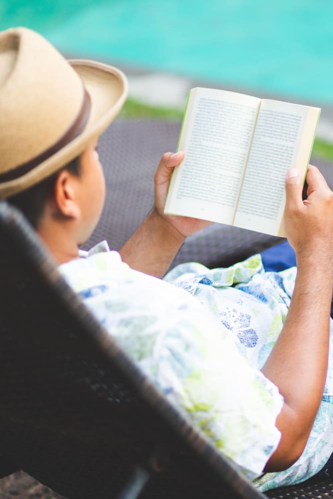 Reading by the pool at 3Fifty8 in Lexington, Kentucky