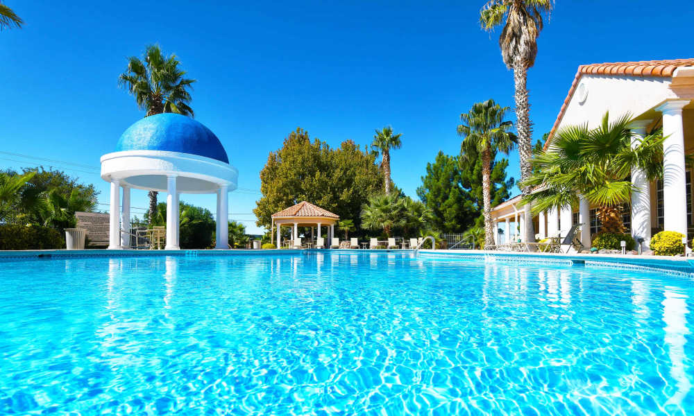 Sparkling pool beside the shaded cabanas at Las Ventanas in Alamogordo, New Mexico