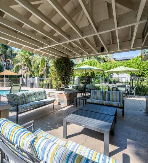 Community outdoor seating at UCE Apartment Homes in Fullerton, California, 