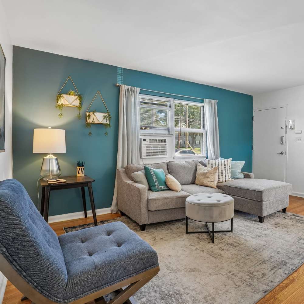 Living room at Elmwood Village Apartments & Townhomes in Elmwood Park, New Jersey