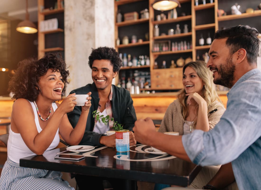 Group of residents having some coffee at The Abbey at Energy Corridor in Houston, Texas