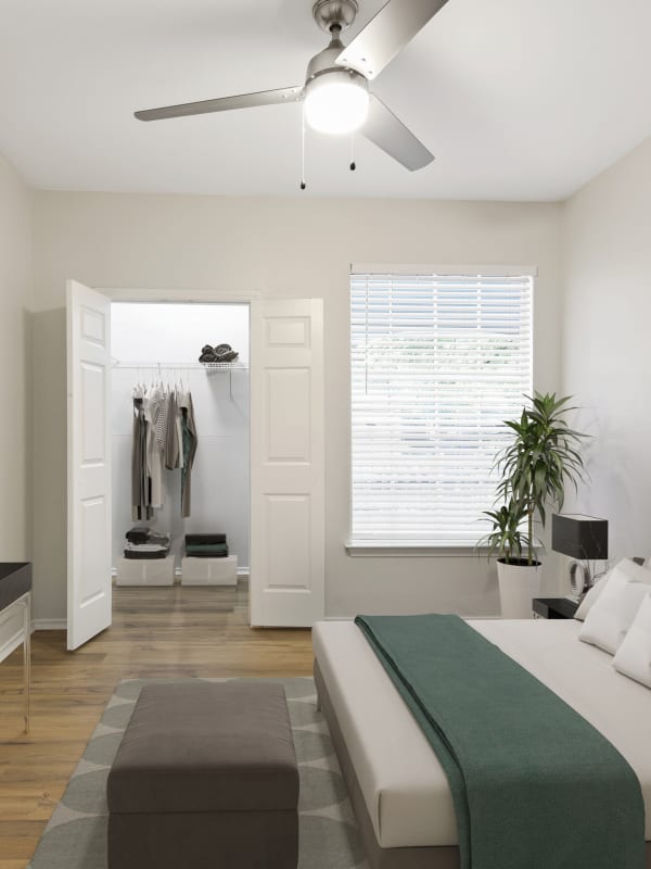 Bedroom with ceiling fan at Lantower Round Rock in Round Rock, Texas