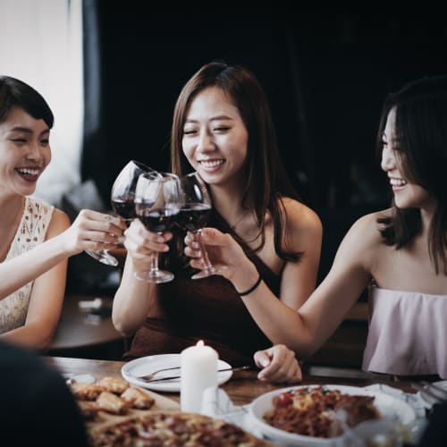 Resident toasting to their new life at 21 West Street in New York, New York