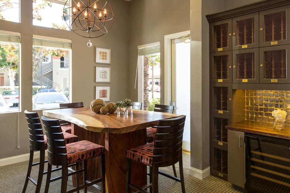 Wine room with private storage lockers at Alicante Apartment Homes in Aliso Viejo, California