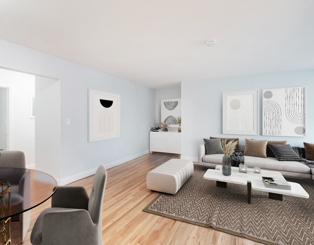 Large windows in living room at Eagle Rock Apartments at Nesconset in Nesconset, New York