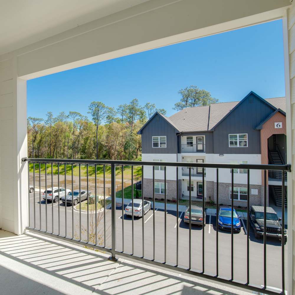 Exterior view of apartments from balcony at Retreat at Redstone in Crestview, Florida