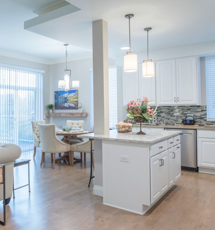 Modern kitchen and plenty of space in independent living home at Village at Belmar