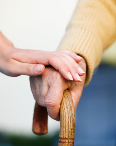 Couple holding hands and walking at The Commons on Thornton in Stockton, California