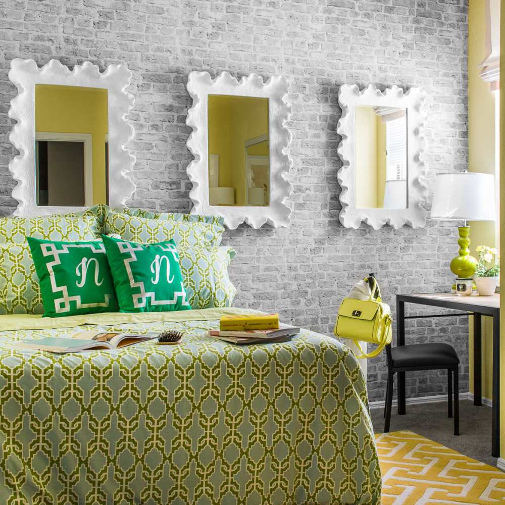 Very cute furnished room with some cool mirrors on the wall at The Ivy in Tampa, Florida