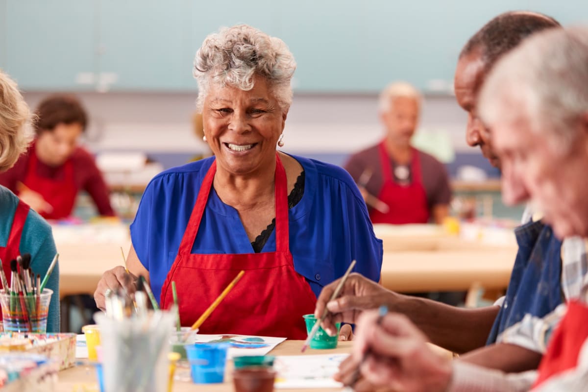 Residents in an art class at Oxford Vista Wichita in Wichita, Kansas