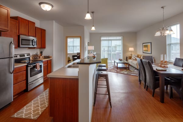 Kitchen and dining room layout at The West End Apartments in Verona, Wisconsin