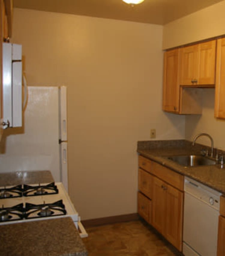 Well equipped kitchen at San Tropez Apartments in Fresno, CA