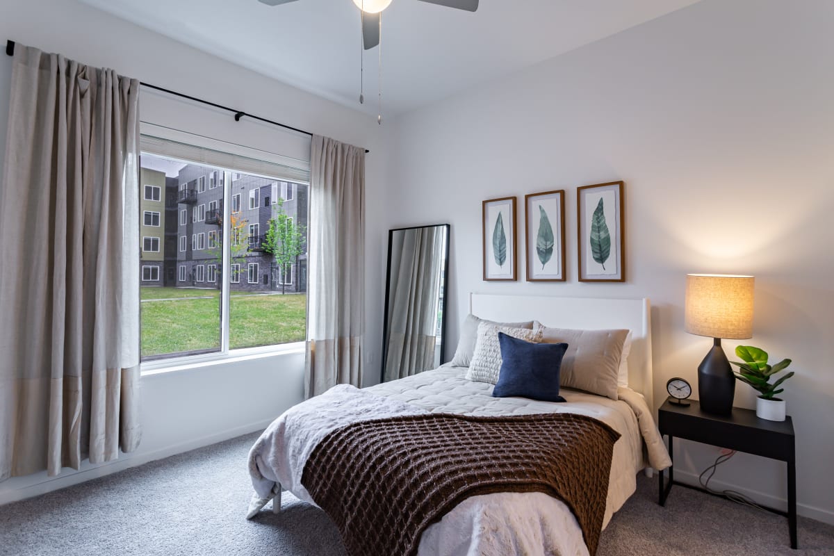 Cozy apartment bedroom at The Ellie in Eden Prairie, Minnesota