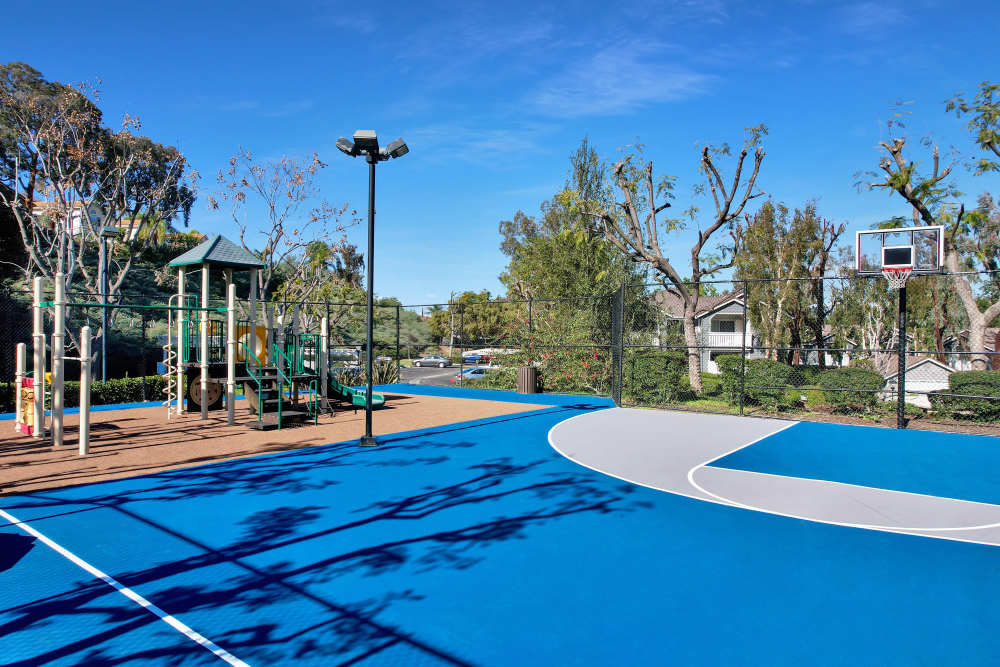 Basketball court and playground at Village Oaks in Chino Hills, California