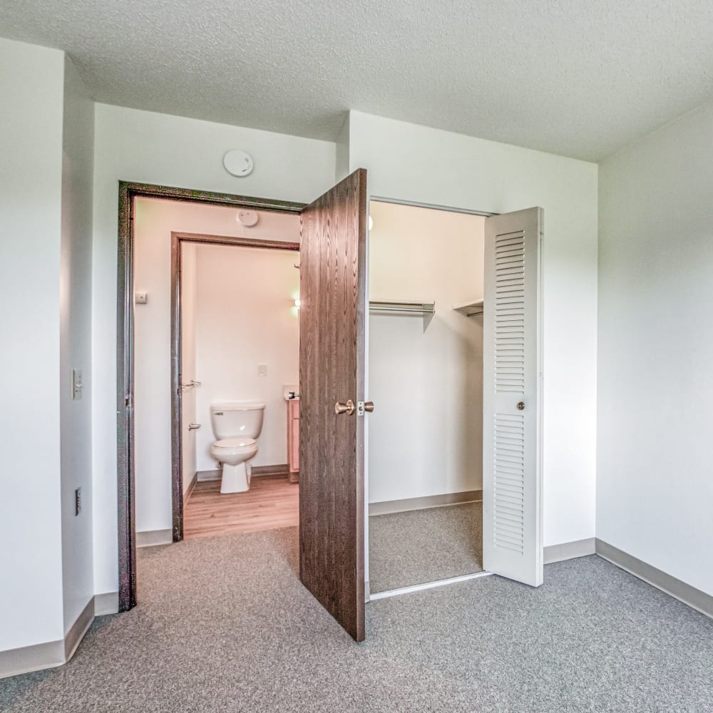 Model bedroom with large closet Lakeland Place in Waterford, Michigan